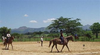 Ann giving riding lesson